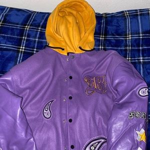 Purple and gold varsity jacket
